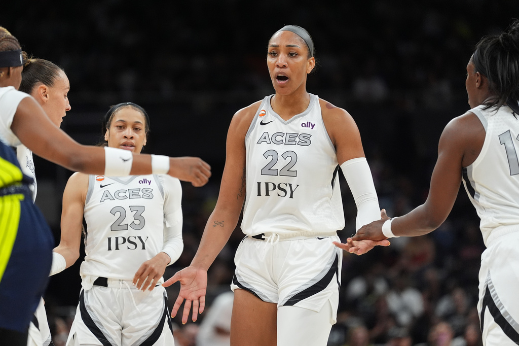 Las Vegas Aces center A'ja Wilson (22) celebrates a play with teammates during the first half of a WNBA preseason basketball game against the Dallas Wings in Austin, Texas, Sunday, May 3, 2026. (AP Photo/Eric Gay)