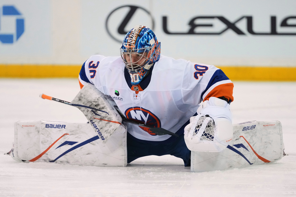 New York Islanders goaltender Ilya Sorokin (30) stretches during a pause in play during the second period of an NHL hockey game against the New York Rangers Thursday, Jan. 29, 2026, in New York. (AP Photo/Frank Franklin II)