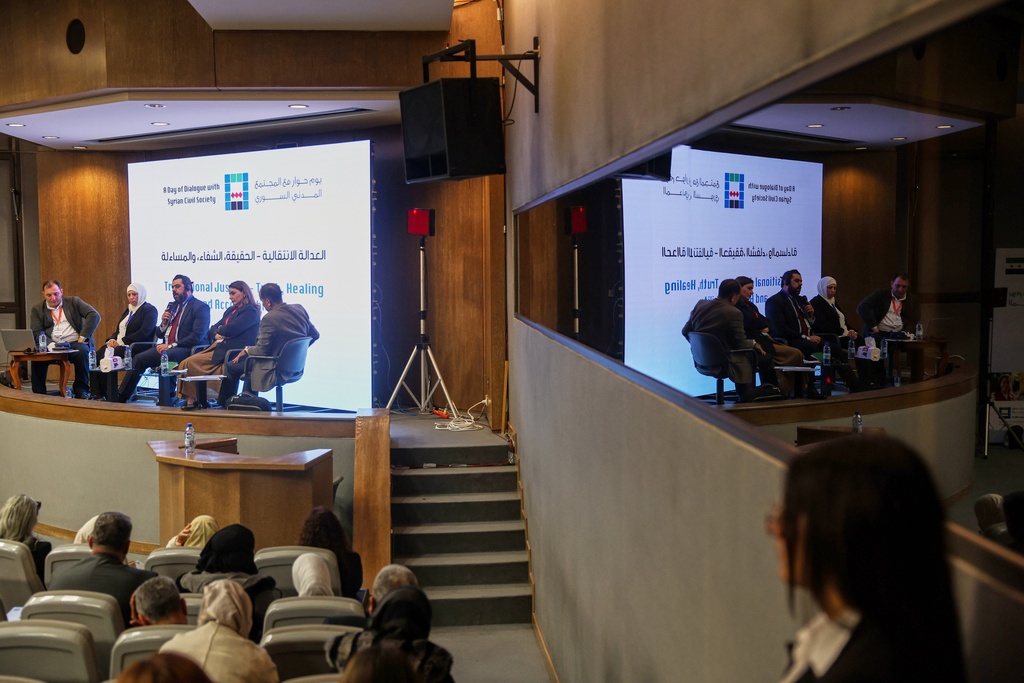Representatives of Syria's civil society attend the opening session of a series of EU-organized meetings known as 'The Day of Dialogue,' in the presence of European Union and transitional government officials at a conference center on the southern outskirts of Damascus, Saturday, Nov. 15, 2025. (AP Photo/Ghaith Alsayed)