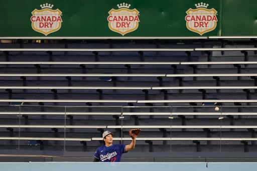 Los Angeles Dodgers' Shohei Ohtani throws in the bullpen during a World Series baseball media day, Thursday, Oct. 23, 2025, in Toronto. The Toronto Blue Jays face the Los Angeles Dodgers in Game 1 on Friday. (AP Photo/Brynn Anderson) Los Angeles Dodgers' Shohei Ohtani throws in the bullpen during a World Series baseball media day, Thursday, Oct. 23, 2025, in Toronto. The Toronto Blue Jays face the Los Angeles Dodgers in Game 1 on Friday. (AP Photo/Brynn Anderson)