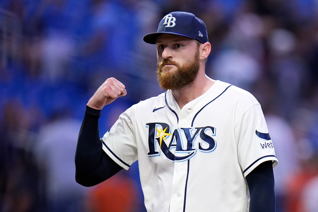 Tampa Bay Rays pitcher Bryan Baker pumps his fist after closing out the Baltimore Orioles during the ninth inning of a baseball game Monday, Aug. 17, 2026, in St. Petersburg, Fla. (AP Photo/Chris O'Meara)