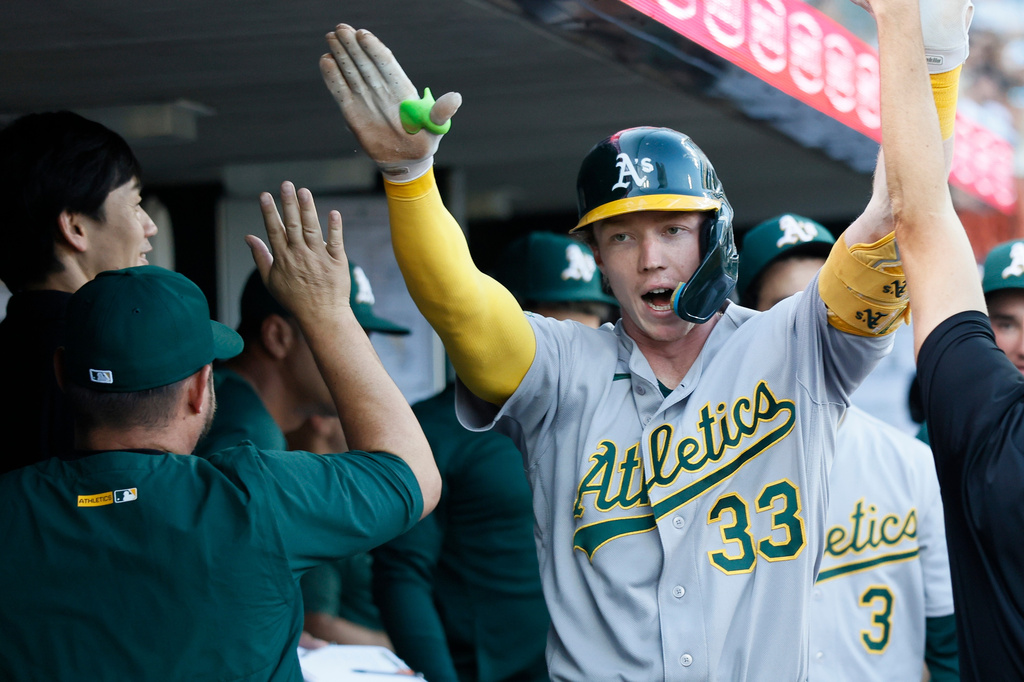 Athletics' Henry Bolte (33) celebrates after hitting a home run against the Detroit Tigers during the third inning of a baseball game, Tuesday, July 7, 2026, in Detroit. (AP Photo/Duane Burleson)