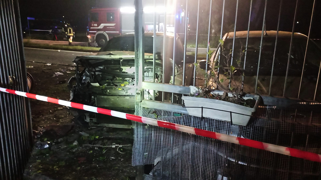 This image released by investigative journalist Sigfrido Ranucci shows his destroyed car, left, outside his home after an explosive device detonated beneath it, in Pomezia, near Rome, Italy, on Thursday, Oct. 16, 2025. (Sigfrido Ranucci via AP, HO)