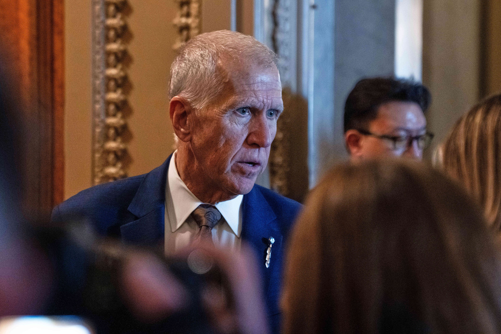 Sen. Thom Tillis, R-N.C., speaks to members of the media at the Capitol, Thursday, Feb. 12, 2026, in Washington. (AP Photo/Allison Robbert)