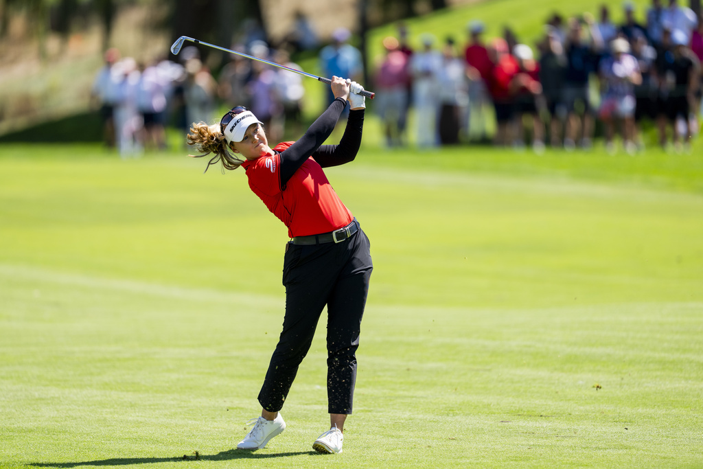 Brooke Henderson plays off the fairway on the 18th hole during the second round of the Canadian Women's Open golf tournament in Mississauga, Ont., Friday, Aug. 22, 2025. (Thomas Skrlj /The Canadian Press via AP)