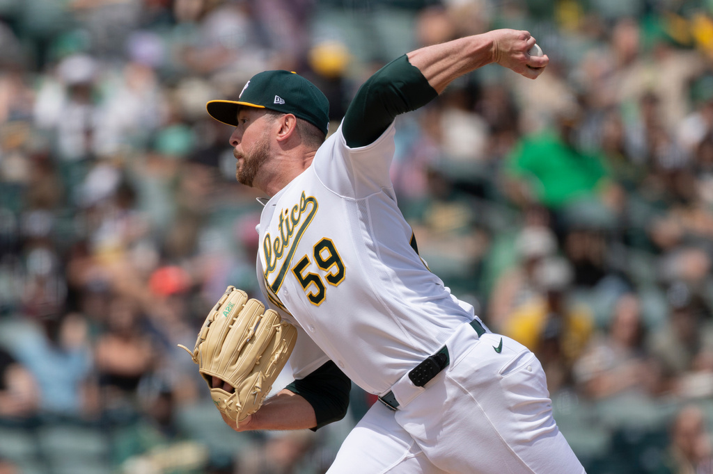 Athletics pitcher Jeffrey Springs throws to the Chicago White Sox during the first inning of a baseball game Sunday, April 19, 2026, in West Sacramento, Calif. (AP Photo/Sara Nevis)