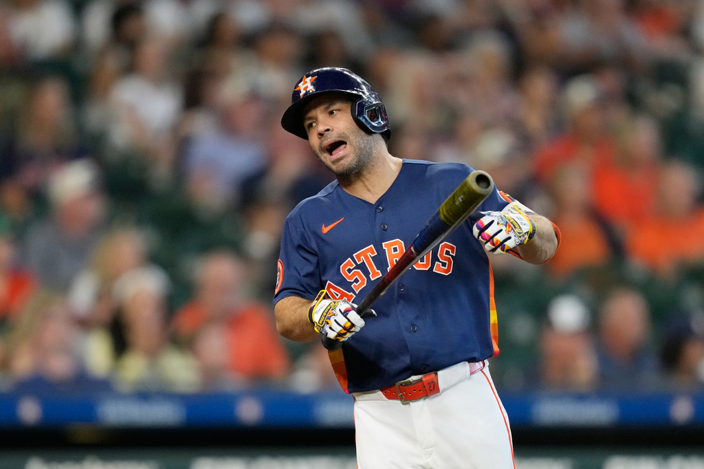 Houston Astros' Jose Altuve reacts after hitting a line out to end the sixth inning of a baseball game against the Athletics Sunday, Aug. 23, 2026, in Houston. (AP Photo/David J. Phillip)