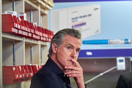 California Gov. Gavin Newsom listens media questions after announcing CalRx-branded insulin glargine pens available next Jan. 1, 2026, at a suggested retail price of no more than $55 per five-pack, or $11 per pen, during a news conference at Cedar-Sinai's Mark Goodson pharmacy in Los Angeles Thursday, Oct. 16, 2025. (AP Photo/Damian Dovarganes) California Gov. Gavin Newsom listens media questions after announcing CalRx-branded insulin glargine pens available next Jan. 1, 2026, at a suggested retail price of no more than $55 per five-pack, or $11 per pen, during a news conference at Cedar-Sinai's Mark Goodson pharmacy in Los Angeles Thursday, Oct. 16, 2025. (AP Photo/Damian Dovarganes)