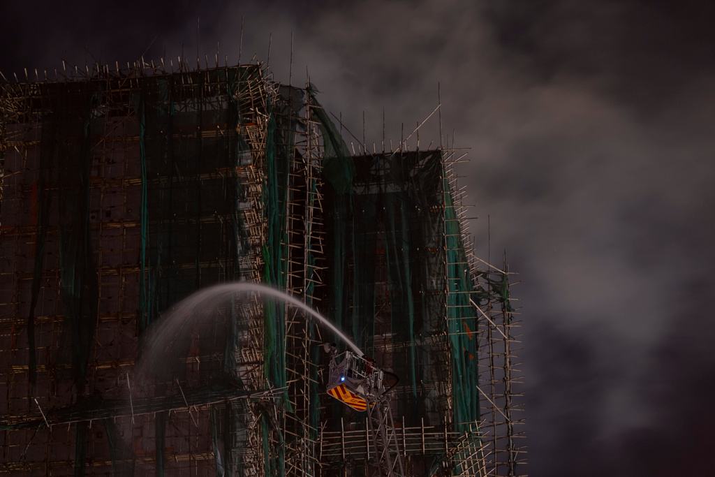 Firefighting efforts continue for a second day after a fire at Wang Fuk Court, a residential estate in the Tai Po district of Hong Kong's New Territories, Thursday, Nov. 27, 2025. (AP Photo/Ng Han Guan)