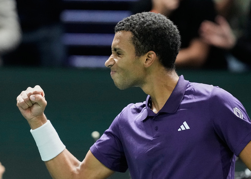 Felix Auger-Aliassime of Canada reacts after defeating Daniel Altmaier of Germany during their third round match at the Paris Masters tennis tournament at the Paris La Defense Arena, Thursday, Oct. 30, 2025, in Paris. (AP Photo/Michel Euler) Felix Auger-Aliassime of Canada reacts after defeating Daniel Altmaier of Germany during their third round match at the Paris Masters tennis tournament at the Paris La Defense Arena, Thursday, Oct. 30, 2025, in Paris. (AP Photo/Michel Euler)