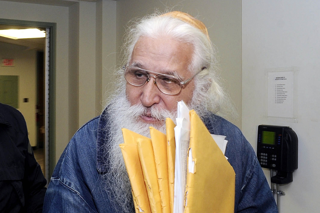 FILE - Convicted child sex offender Jose Ramos is led by sheriff deputies into the Luzerne County Courthouse for a hearing, Oct. 25, 2013, in Wilkes-Barre, Pa. (Mark Moran/The Citizens' Voice via AP, File)