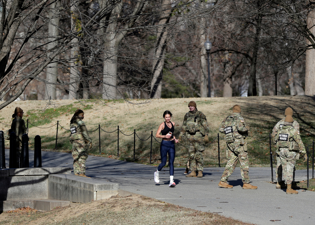 National Guard patrol in the Lincoln Memorial, Thursday, Dec. 11, 2025, in Washington. (AP Photo/Rahmat Gul)