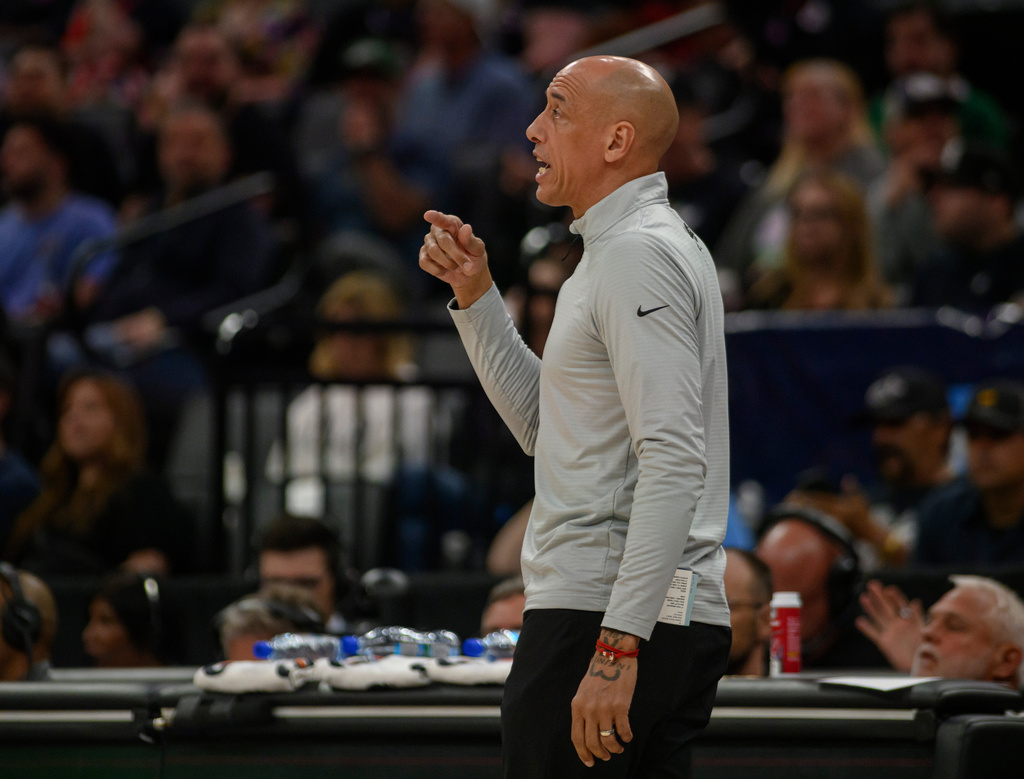 Sacramento Kings head coach Doug Christie shouts instructions from the bench during the first half of an NBA basketball game against the Los Angeles Clippers in Sacramento, Calif., Sunday, April 5, 2026. (AP Photo/Randall Benton)