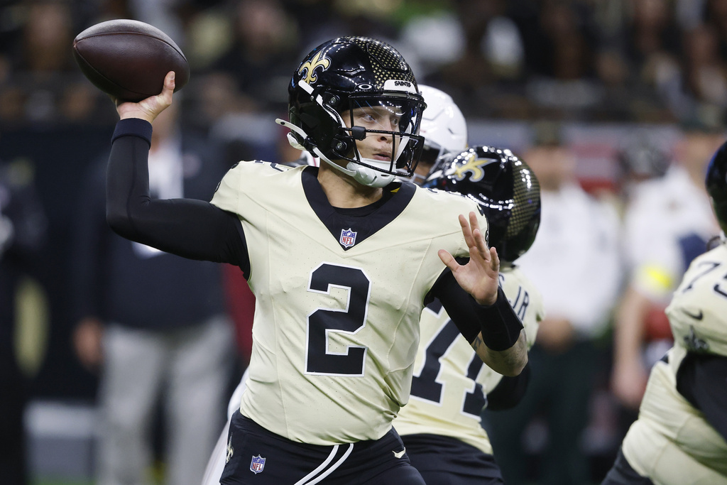 New Orleans Saints quarterback Spencer Rattler throws against the Arizona Cardinals during the first half of an NFL football game Sunday, Sept. 7, 2025, in New Orleans. (AP Photo/Butch Dill)