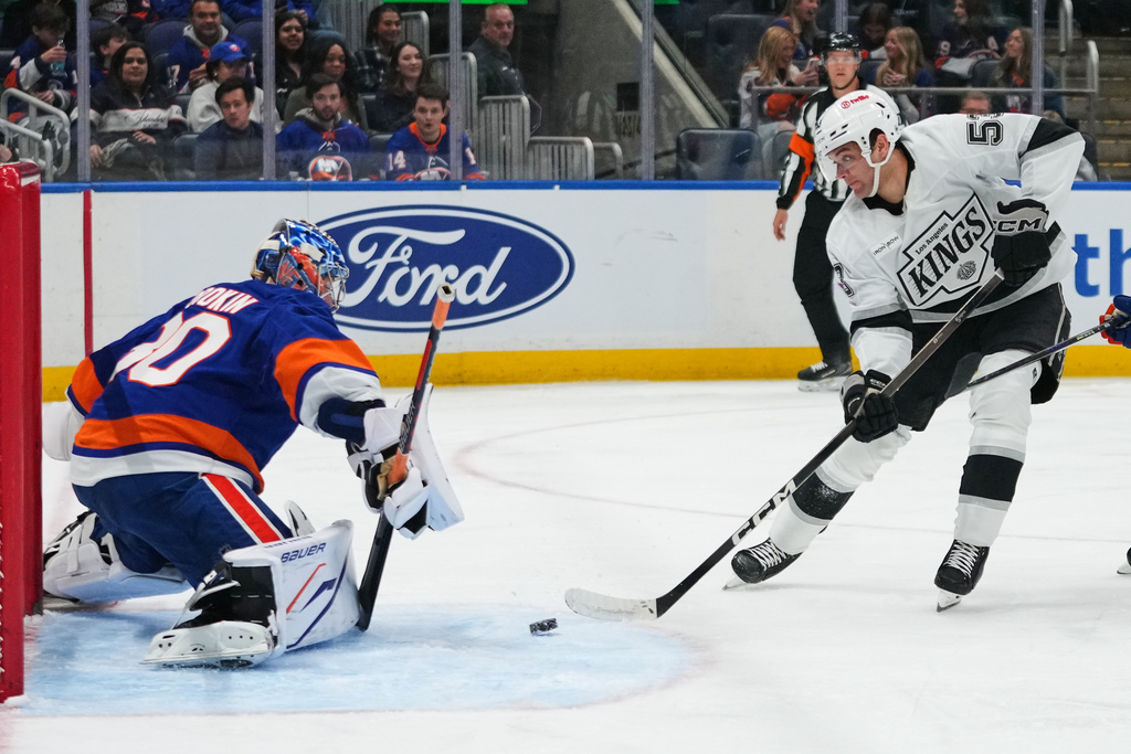 New York Islanders goaltender Ilya Sorokin (30) protects the net from Los Angeles Kings' Jared Wright (53) during the third period of an NHL hockey game Friday, March 13, 2026, at UBS Arena in Elmont, N.Y. (AP Photo/Frank Franklin II)
