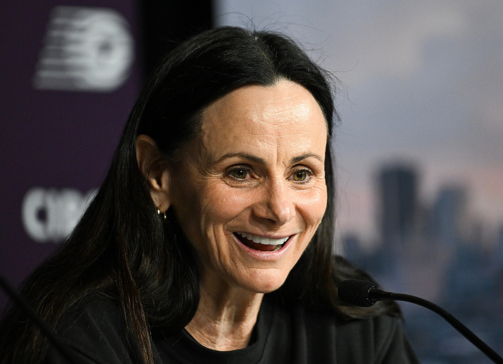 Toronto Tempo head coach Sandy Brondello speaks to the media prior to a WNBA basketball game against the New York Liberty in Montreal, Sunday, July 12, 2026. (Graham Hughes/The Canadian Press via AP)