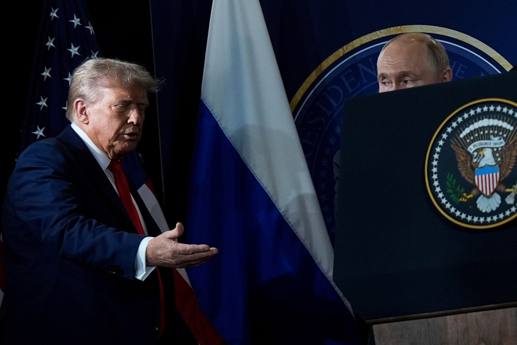 FILE - President Donald Trump and Russian President Vladimir Putin arrive for a press conference at Joint Base Elmendorf- Richardson in Anchorage, Alaska, Aug. 15, 2025. (AP Photo/Julia Demaree Nikhinson, File)