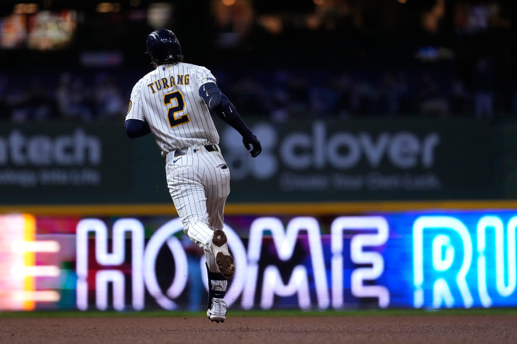 Milwaukee Brewers' Brice Turang rounds the bases after hitting a two-run home run during the fifth inning of a baseball game against the St. Louis Cardinals, Saturday, Sept. 26, 2026, in Milwaukee. (AP Photo/Aaron Gash)