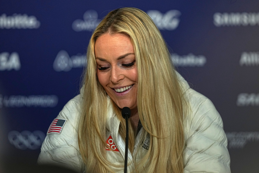 United States' Lindsey Vonn attends a press conference by the U.S. ski team at the 2026 Winter Olympics, in Cortina d'Ampezzo, Italy, Tuesday, Feb. 3, 2026. (AP Photo/Fatima Shbair)