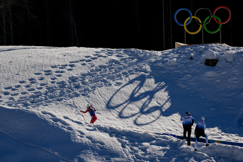 Johannes Hoesflot Klaebo, of Norway, skis uphill during the cross country skiing men's 4 x 7.5km relay at the 2026 Winter Olympics, in Tesero, Italy, Sunday, Feb. 15, 2026. (AP Photo/Matthias Schrader)