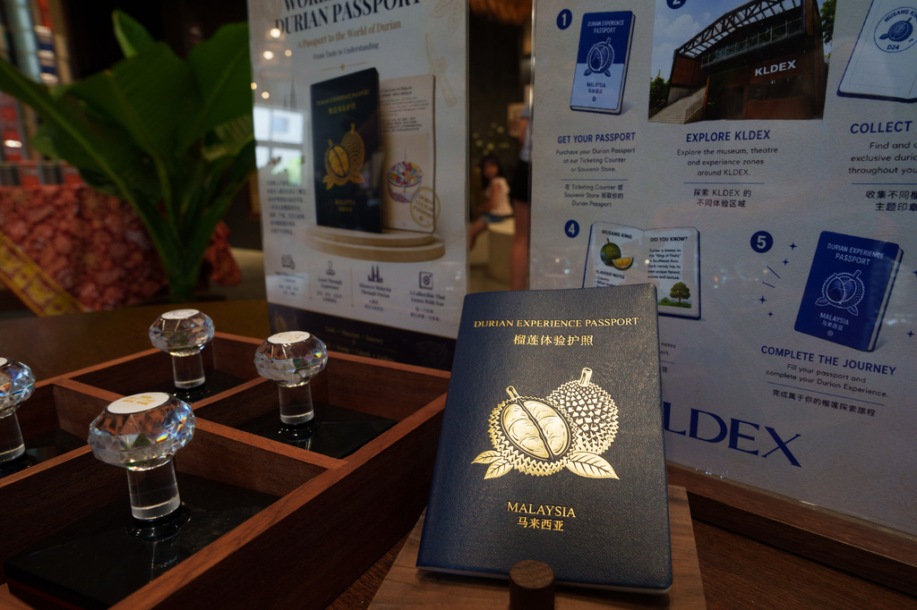 A "Durian Passport" is displayed at KLDEX (Kuala Lumpur Durian Experience Centre) in Kuala Lumpur, Malaysia, Friday, June 26, 2026. (AP Photo/Vincent Thian)