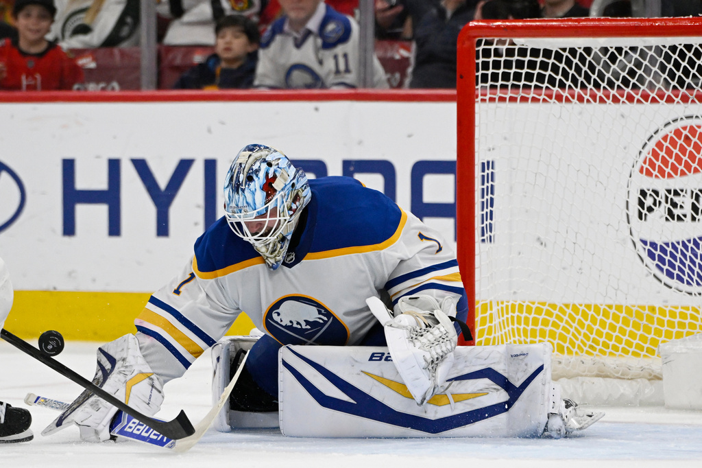 Buffalo Sabres goalie Ukko-Pekka Luukkonen makes a save during the second period of an NHL hockey game against the Chicago Blackhawks in Chicago, Monday, April 13, 2026. (AP Photo/Paul Beaty)