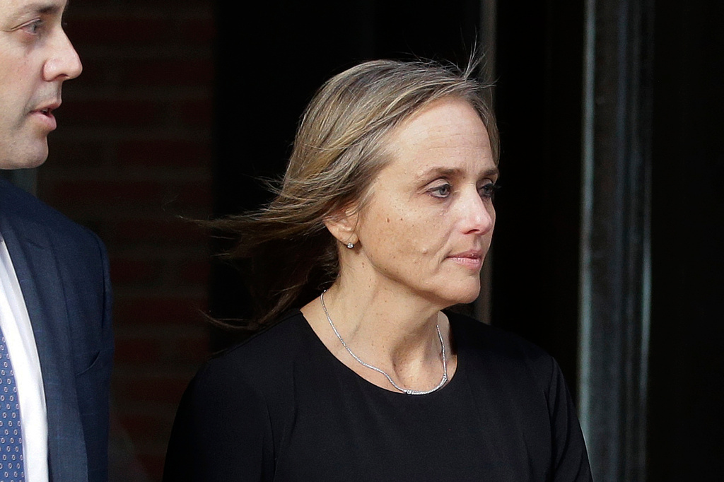 FILE - District Court Judge Shelley Joseph departs federal court, April 25, 2019, in Boston. (AP Photo/Steven Senne, File)
