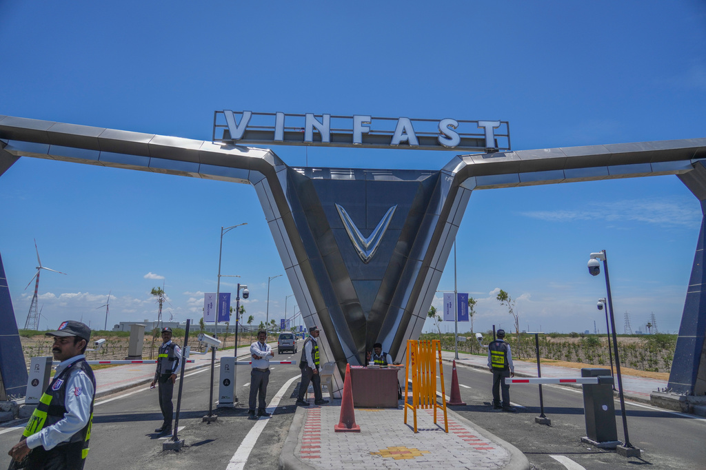 FILE - Private security officers stand guard at the entrance of the VinFast electric vehicle plant in Thoothukudi, in the southern Indian state of Tamil Nadu, Monday, Aug. 4, 2025. (AP Photo/Rafiq Maqbool, File)