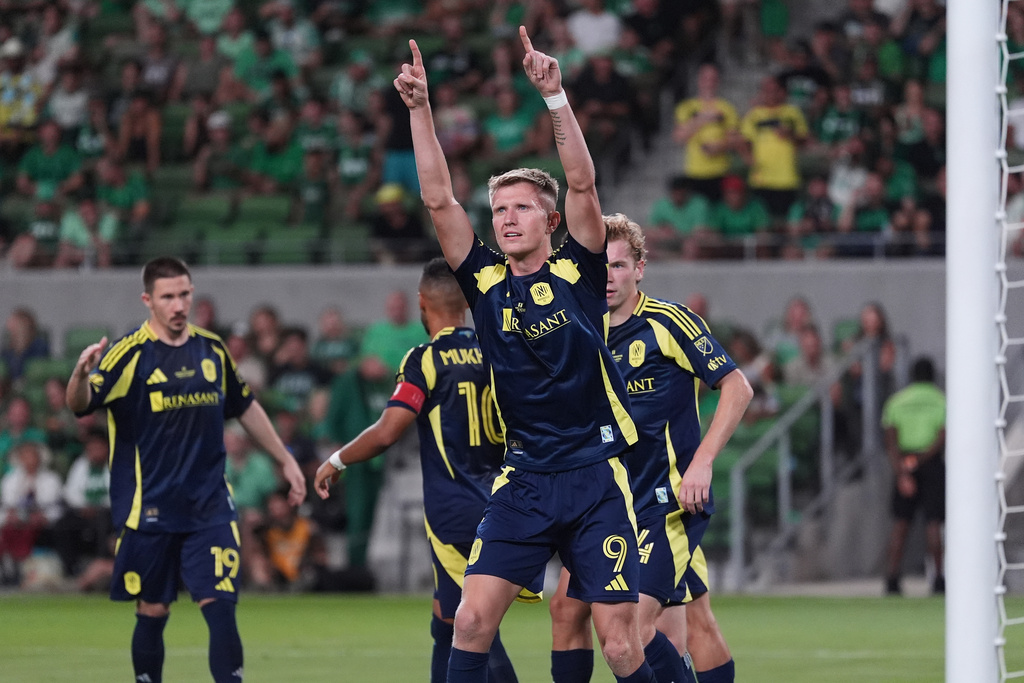 Nashville SC forward Sam Surridge (9) celebrates his goal against Austin FC during the second half of an U.S. Open Cup final soccer match in Austin, Texas, Wednesday, Oct. 1, 2025. (AP Photo/Eric Gay)