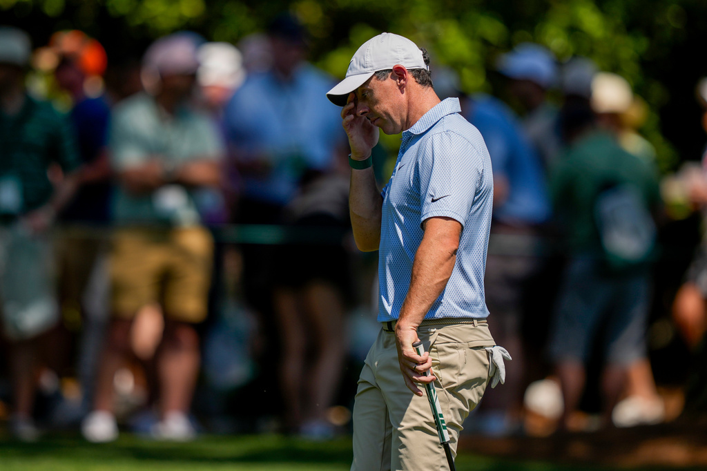Rory McIlroy, of Northern Ireland, walks to green on the first hole during the final round of the Masters golf tournament at the Augusta National Golf Club, Sunday, April 12, 2026, in Augusta, Ga. (AP Photo/Matt Slocum)