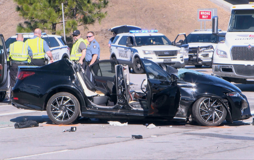 This image taken from video provided by WTOC-TV shows law enforcement responding to the scene of a fatal car crash, Monday, Feb. 16, 2026, in Savannah, Ga. (WTOC-TV via AP)