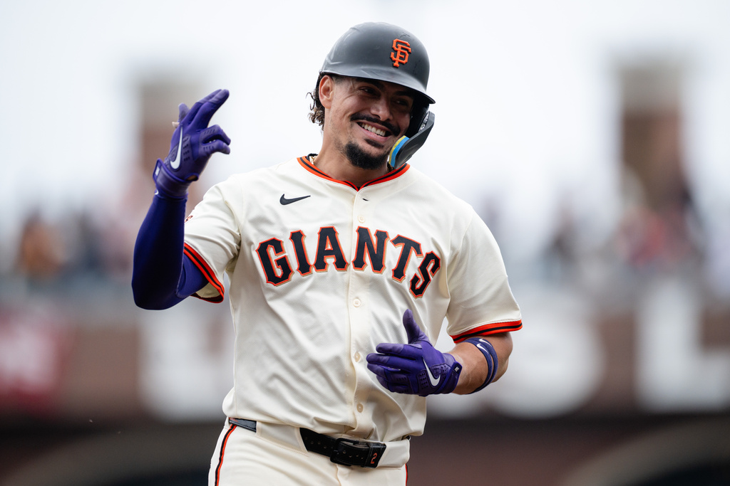 San Francisco Giants' Willy Adames rounds the bases after hitting a solo home run during the first inning of a baseball game against the Colorado Rockies, Sunday, Sept. 28, 2025, in San Francisco. (AP Photo/Thien-An Truong)
