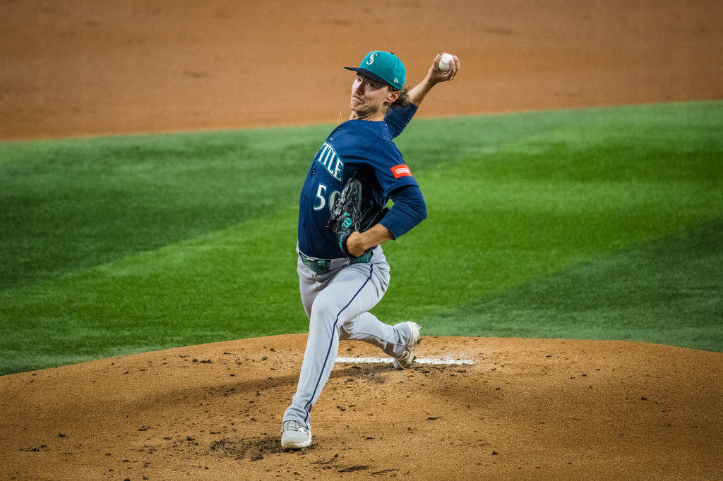 Seattle Mariners' Bryce Miller pitches during the first inning of a baseball game against the Texas Rangers, Friday, July 24, 2026, Arlington, Texas. (AP Photo/Jessica Tobias)