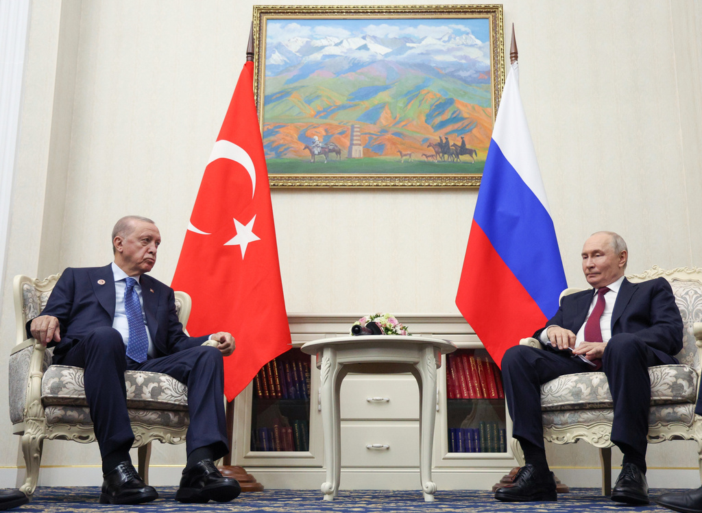 Russian President Vladimir Putin, right, and Turkish President Recep Tayyip Erdogan talk during their meeting on the sidelines of the Shanghai Cooperation Organization (SCO), in Bishkek, Kyrgyzstan, on Tuesday, Sept. 1, 2026. (Vyacheslav Prokofyev, Sputnik, Kremlin Pool Photo via AP)