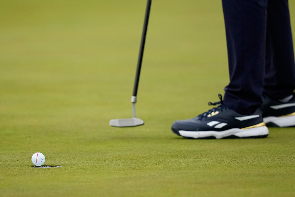 Bryson DeChambeau makes a putt on the 10th hole during the first round of the PGA Championship golf tournament practice round at Aronimink Golf Club, Thursday, May 14, 2026, in Newtown Square, PA. (AP Photo/Carolyn Kaster)