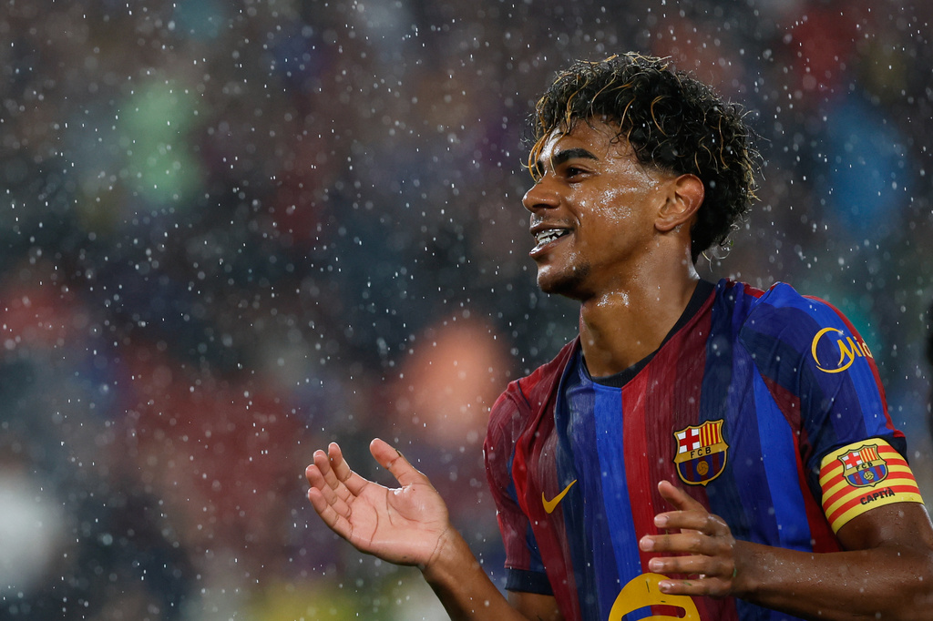 Barcelona's Lamine Yamal celebrates after scoring his side's seventh goal during a Spanish La Liga soccer match between Barcelona and Racing de Santander in Barcelona, Spain, Wednesday, Sept. 16, 2026. (AP Photo/Joan Monfort)