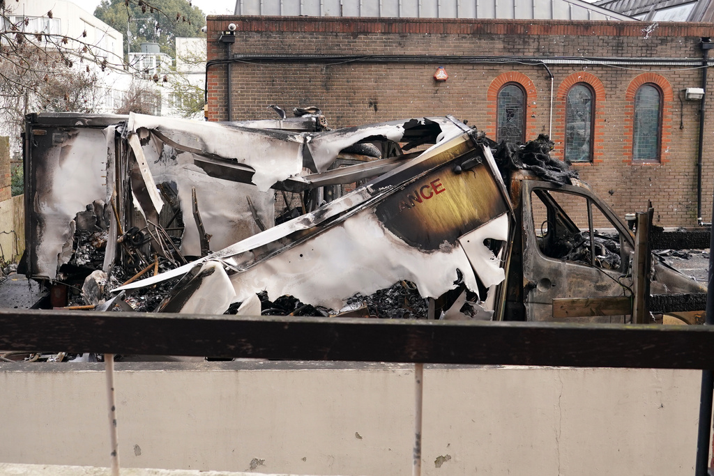 View at burnt ambulances in a car park at Golders Green in London, Monday, March 23, 2026 after an apparent arson attack on four vehicles belonging to a Jewish ambulance service, Hatzola Northwest.(AP Photo/Alberto Pezzali)