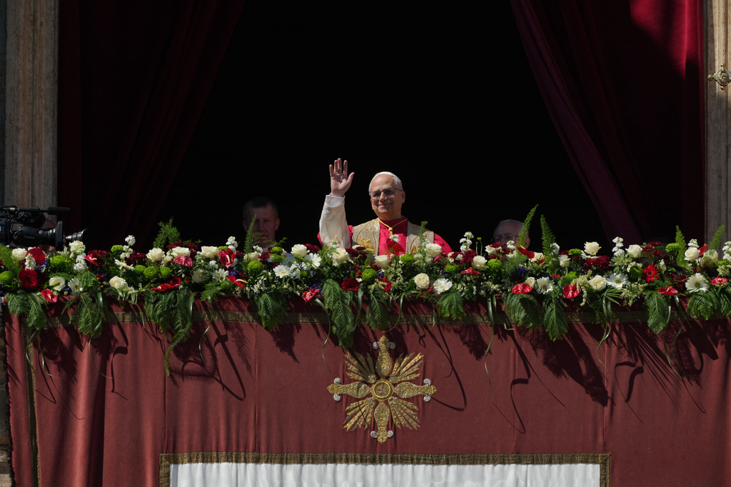 Pope Leo XIV addresses the faithful after delivering the Urbi et Orbi blessing - Latin for "to the city of Rome and to the world" - from the central loggia of St. Peter's Basilica at the end of Easter Mass he presided over in St. Peter's Square at the Vatican, Sunday, April 5, 2026. (AP Photo/Andrew Medichini)