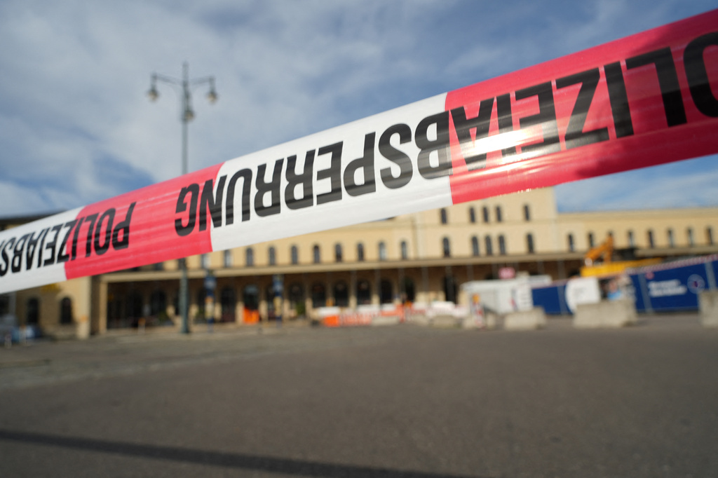 Police cordon off the area near the train station in the southern German city of Augsburg, Wednesday, Sept. 2, 2026. (Felix Kirberg/dpa via AP)