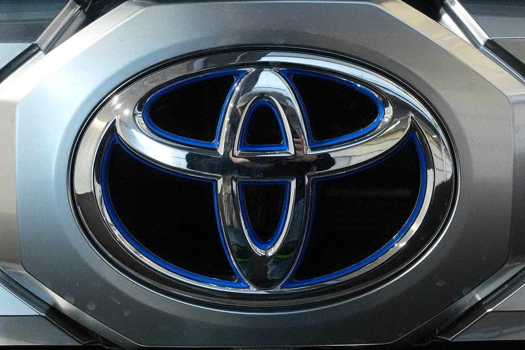 FILE - A Toyota logo is seen on a Toyota Tundra HV 4x4 at the Pittsburgh International Auto Show in Pittsburgh, Feb. 15, 2024. (AP Photo/Gene J. Puskar, File)
