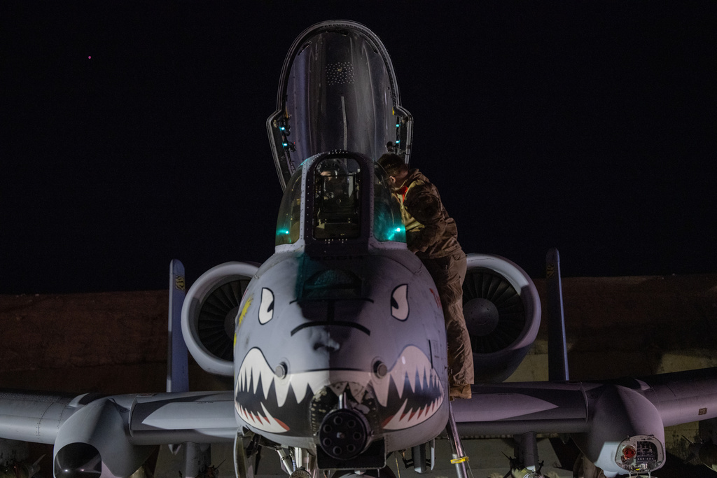 This photo provided by the U.S. Air Force shows a U.S. Airman preparing an A-10 Thunderbolt II for flight from a base in the U.S. Central Command area of responsibility, Friday, Dec. 19, 2025, in support of Operation Hawkeye Strike. (U.S. Air Force/DVIDS via AP)