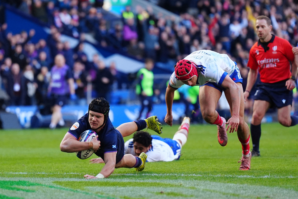 Scotland's Darcy Graham scores a try during the Six Nations rugby match between Scotland and France in Edinburgh, Scotland, Saturday March 7, 2026. (Jane Barlow/PA via AP)