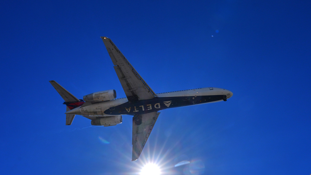 A Delta jet comes in for landing at Dallas Love Field Airport Monday, Oct. 5, 2026, in Dallas. (AP Photo/LM Otero)