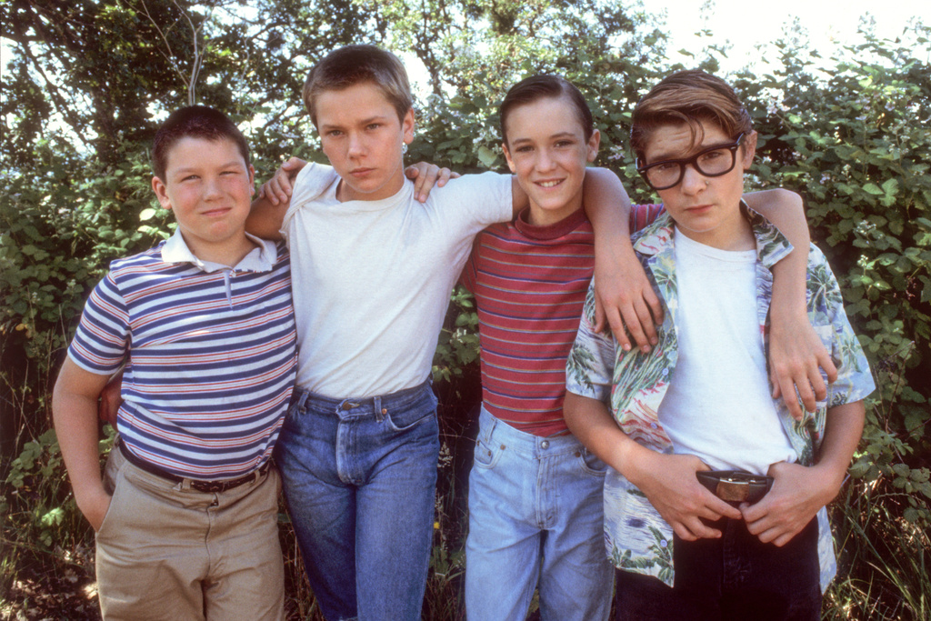 This image released by Sony Pictures shows Jerry O'Connell, from left, River Phoenix, Wil Wheaton and Corey Feldman in a scene from "Stand by Me." (Sony Pictures via AP)