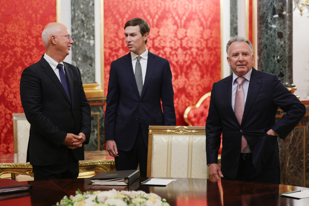 U.S. President Donald Trump's envoys Steve Witkoff, right, Jared Kushner, center, and Presidential Envoy Kirill Dmitriev stand prior to talks at the Senate Palace of the Kremlin in Moscow, on Saturday, Sept. 5, 2026. (Gavriil Grigorov/Sputnik/Kremlin Pool Photo via AP)