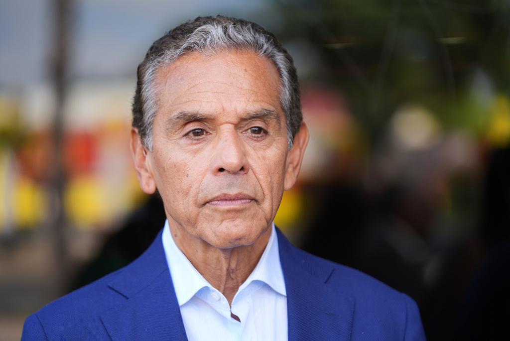 FILE - Antonio Villaraigosa receives an endorsement for governor of California by Mayor Karen Bass on Sept. 9, 2025, in Los Angeles. (AP Photo/Damian Dovarganes, File)