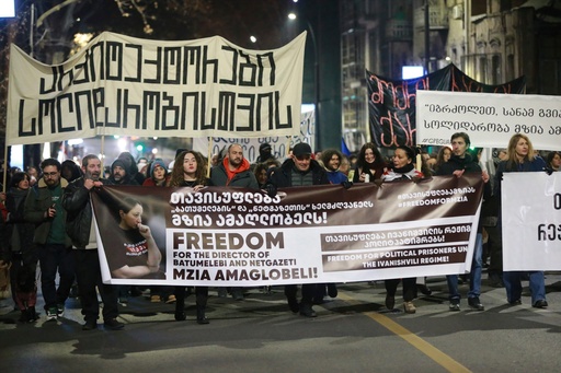 FILE - Protesters hold banners calling for the release of jailed journalist Mzia Amaghlobeli as they march through the streets in Tbilisi, Georgia, on Jan. 29, 2025. (AP Photo/Zurab Tsertsvadze, File) FILE - Protesters hold banners calling for the release of jailed journalist Mzia Amaghlobeli as they march through the streets in Tbilisi, Georgia, on Jan. 29, 2025. (AP Photo/Zurab Tsertsvadze, File)