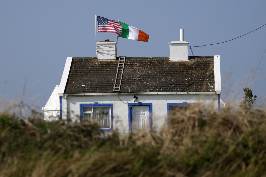 The flag of the United States of America flies over a house in Doonbeg, Ireland, Friday, Sept. 11, 2026, ahead of U.S. President Donald Trump's visit to the Irish Open Golf. (AP Photo/Peter Morrison)