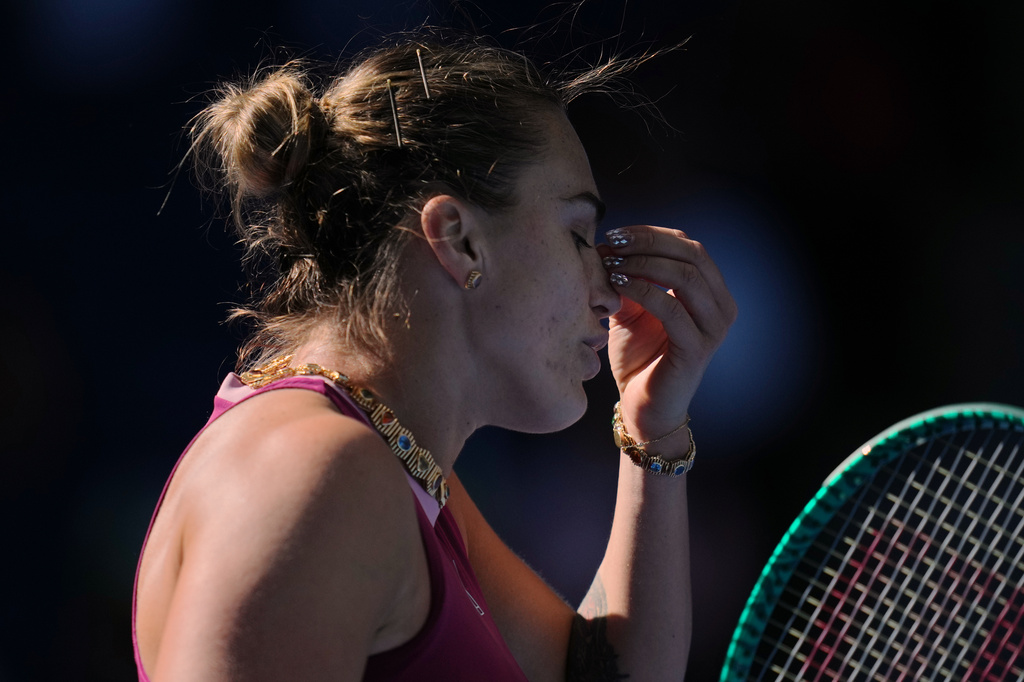 Aryna Sabalenka, of Belarus, reacts during the third round of the women's singles match against Nikola Bartunkova, of the Czech Republic, at the China Open tennis tournament in Beijing, Sunday, Oct. 4, 2026. (AP Photo/Achmad Ibrahim)
