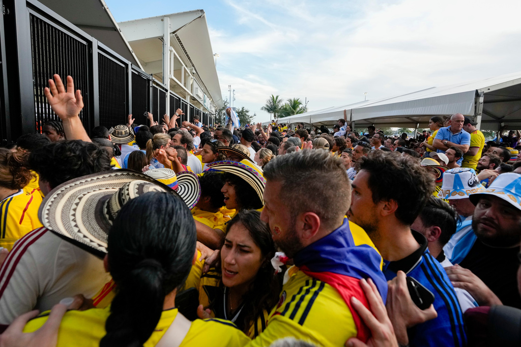 FILE - Fans wait to enter the stadium prior to the Copa America final soccer match between Argentina and Colombia in Miami Gardens, Fla., July 14, 2024. (AP Photo/Lynne Sladky, File)